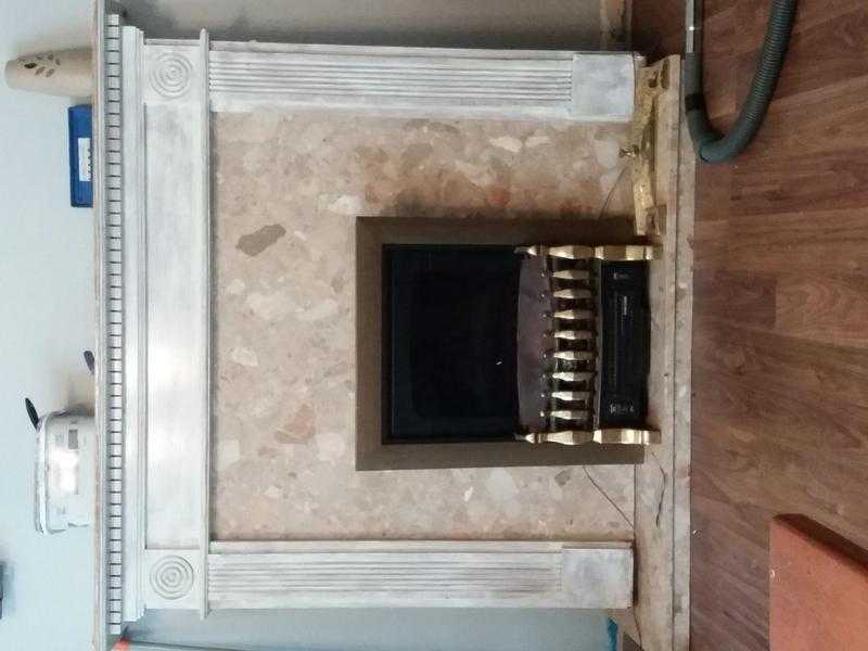 Marble fireplace with surround and electric fire