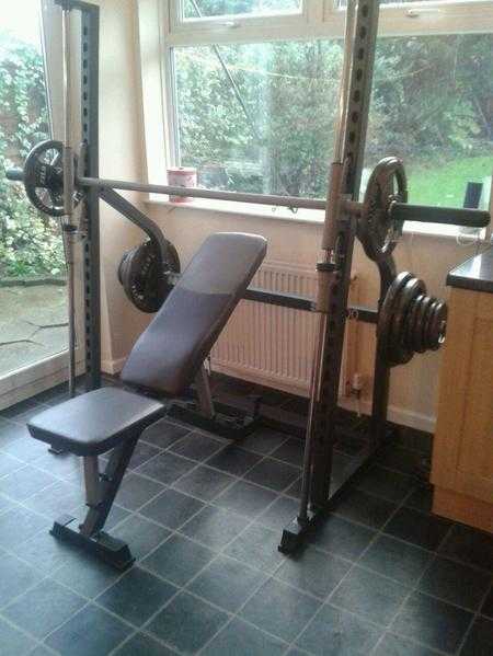 Marcy sm600 Smith machine with bench and 125kg weight set