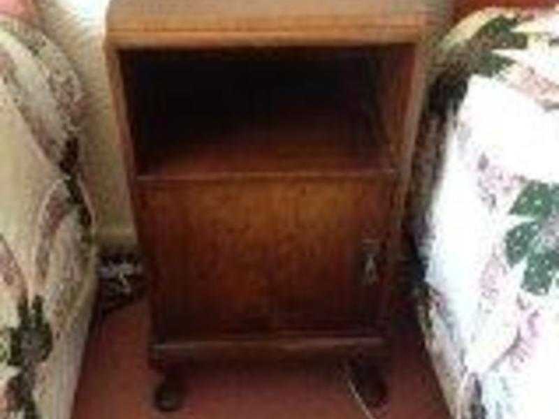 matching pair of wooden bedside cabinet