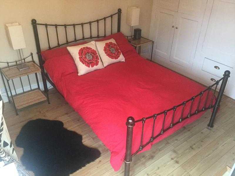 Metal framed antique bronze double bed