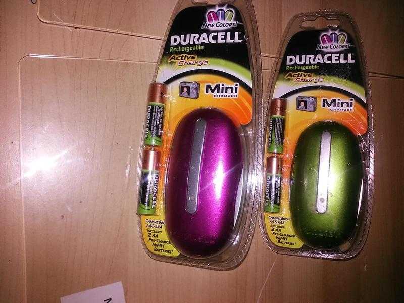 Metallic Pink and green Duracell Rechargeable Mini Color Charger with 2 AA Batteries