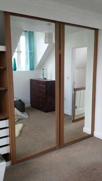 Mirrored sliding wardrobe doors