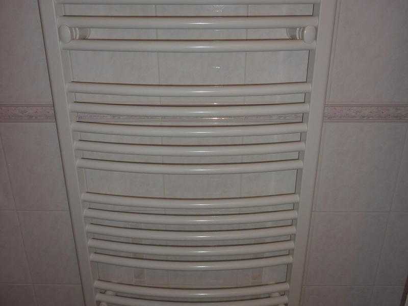 Myson Curved Towel Rail in white, with valves