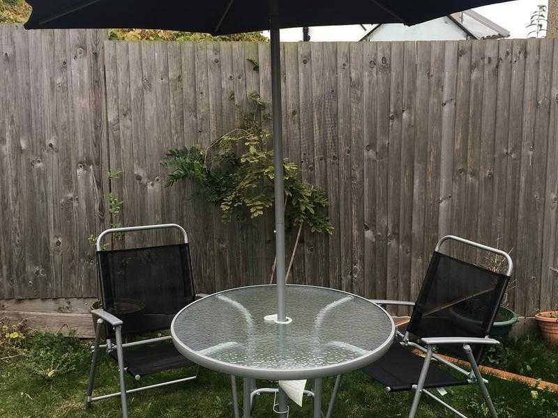 Nearly new garden table amp chairs