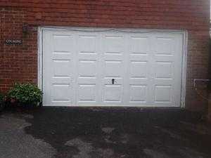 nearly new up and over garage door