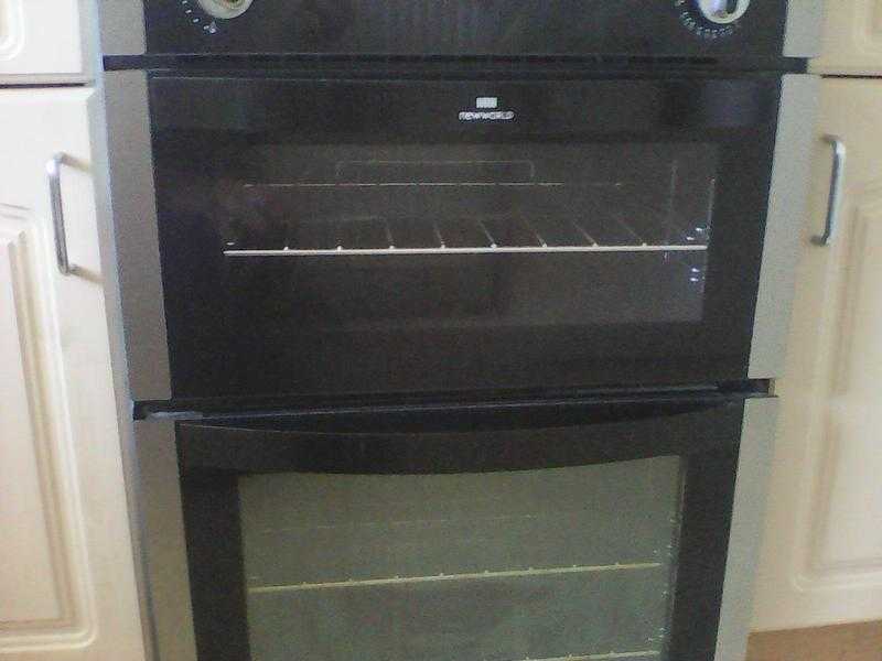 NEW WORLD GAS COOKER MODEL NW1901G DUAL OVEN IN BLACK COST 489.00 NEW 100.00 QUICK SALE