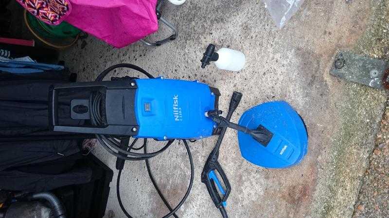 Nilfisk C110.3 pressure washer with patio cleaner