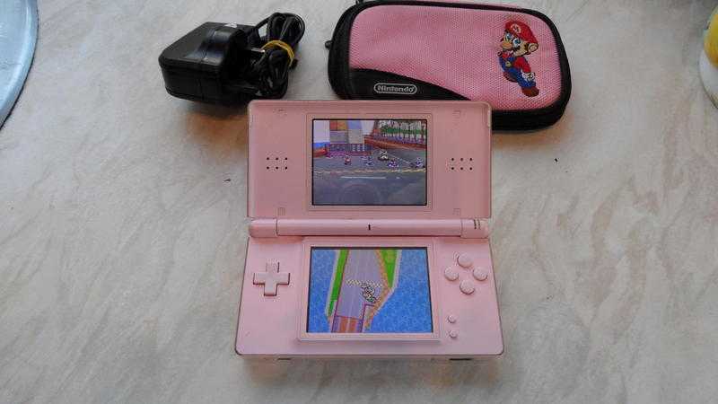 Nintendo ds lite (Pink) with 12 games case and charger