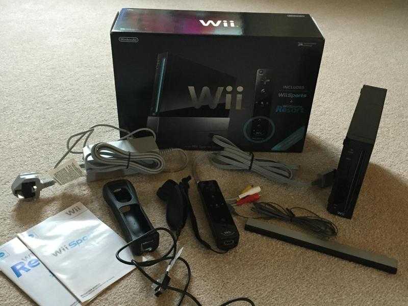 Nintendo Wii Black Console Sports Resort Package and Wii Fit Plus Balance Board