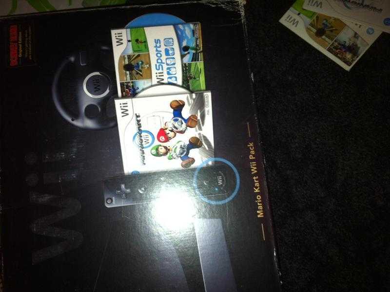 Nintendo wii ( boxed) plus extras