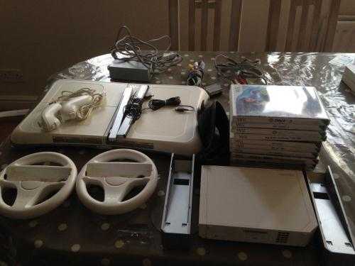 Nintendo Wii console and accessories. Please see description