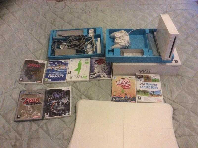 Nintendo Wii console,balance board and games