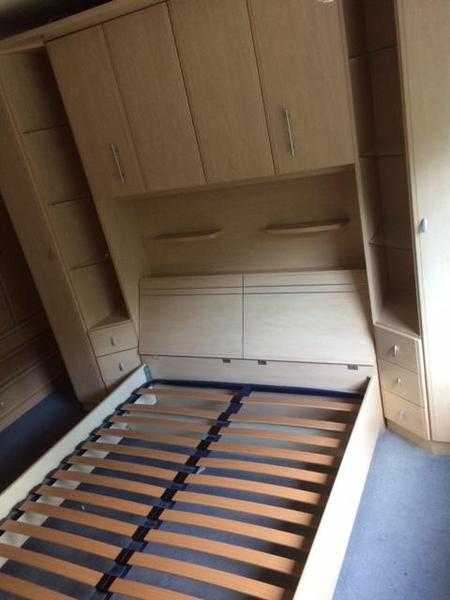 Nolte Overbed storage unit and wardrobe