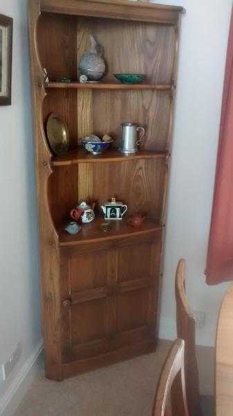 Oak corner shelving unit and cupboard