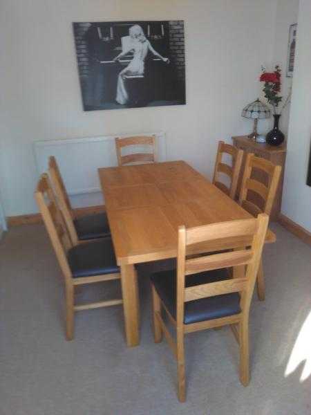 Oak Dining table and six chairs