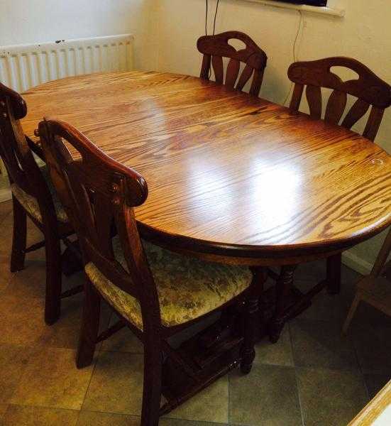 Oak extendable dining table and chairs