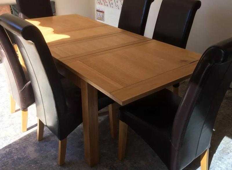 Oak extending dining table