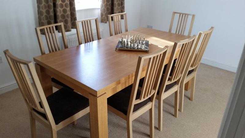 Oak look dining table with 8 oak chairs