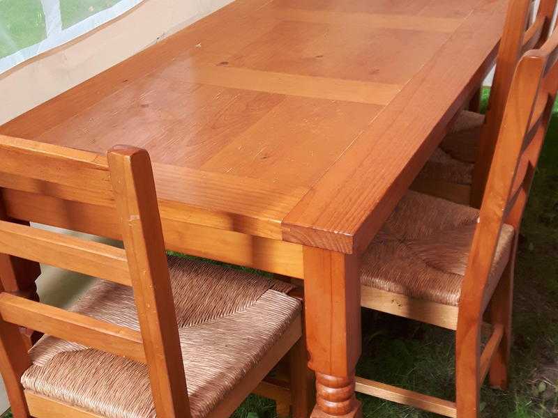 Oak table and six chairs, good condition bought from harveys