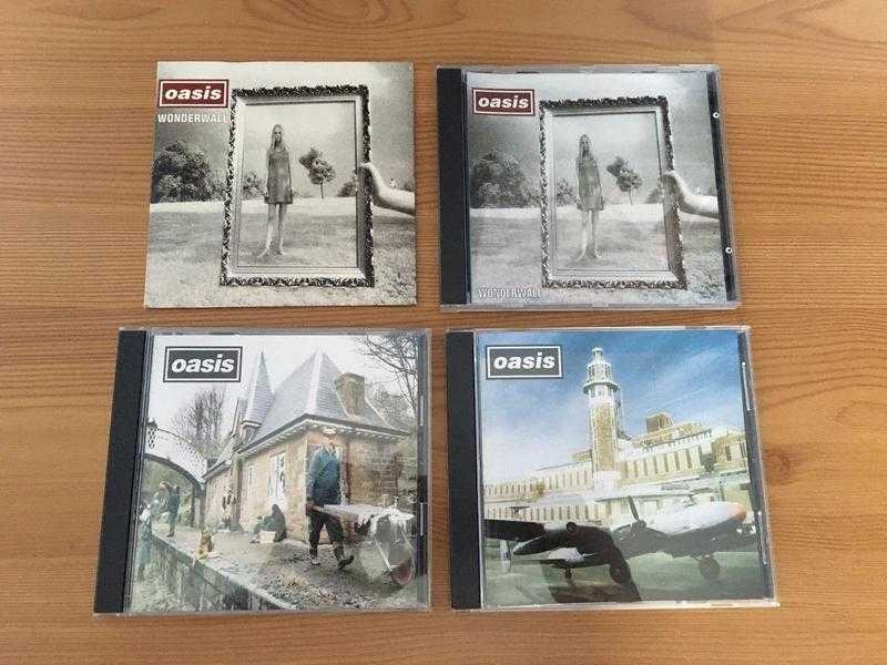 Oasis CD039s - 2 Japanese imports 1 USA import and 1 Australian import