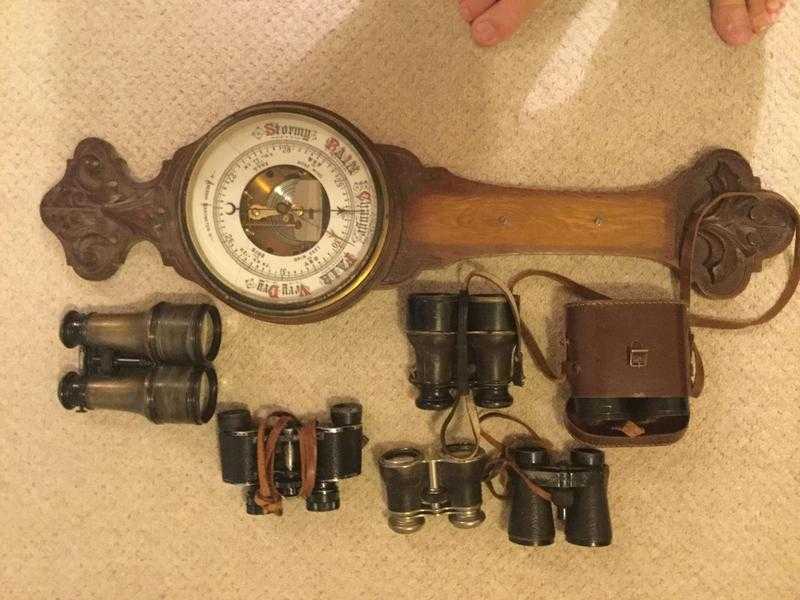 Old binoculars and barometer