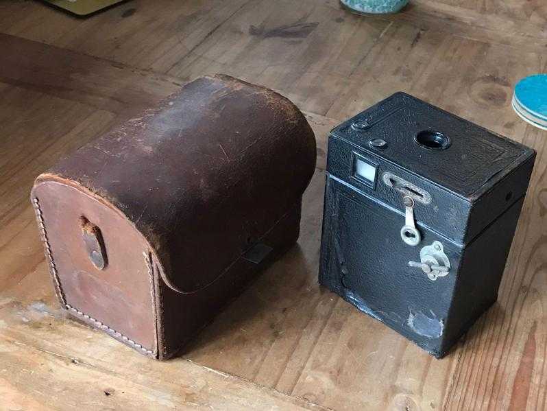 Old browny camera and case.