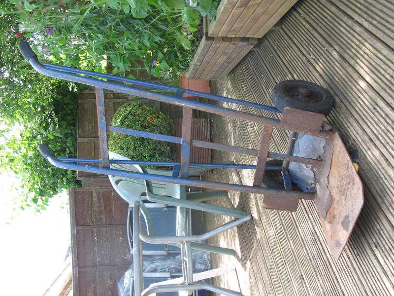 old cast iron trolley with solid rubber tyres