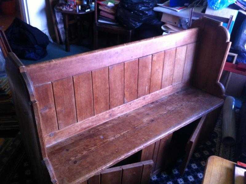 old church pew with storage space underneath seat