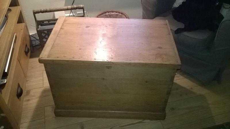 Old stripped pine wooden trunk