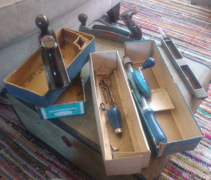 Older woodworking tools (plane, hand drill, files)