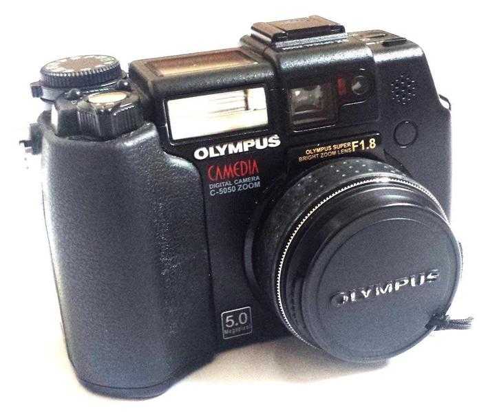 Olympus C-5050 with case, cards, straps, leads, charger  accessories - all in original packing.