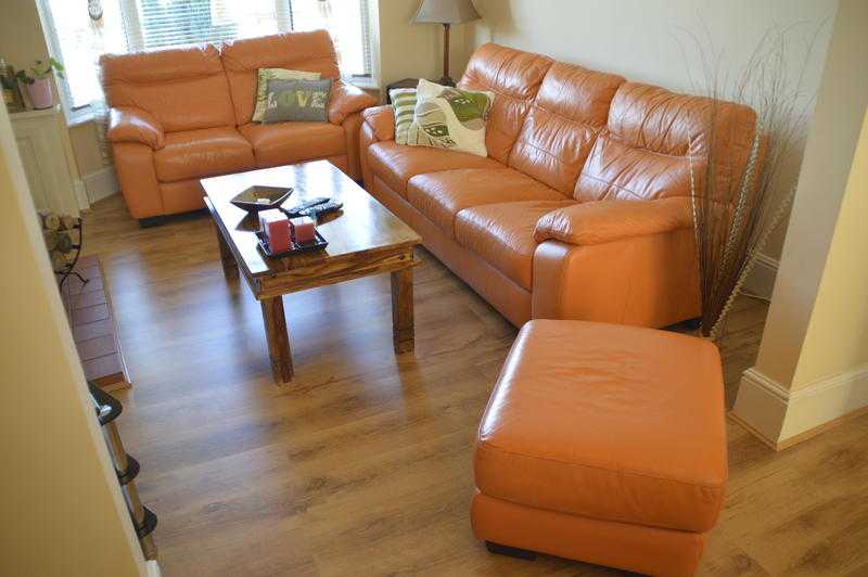 Orange Leather 3 and 2 seater sofas plus footstool only 250