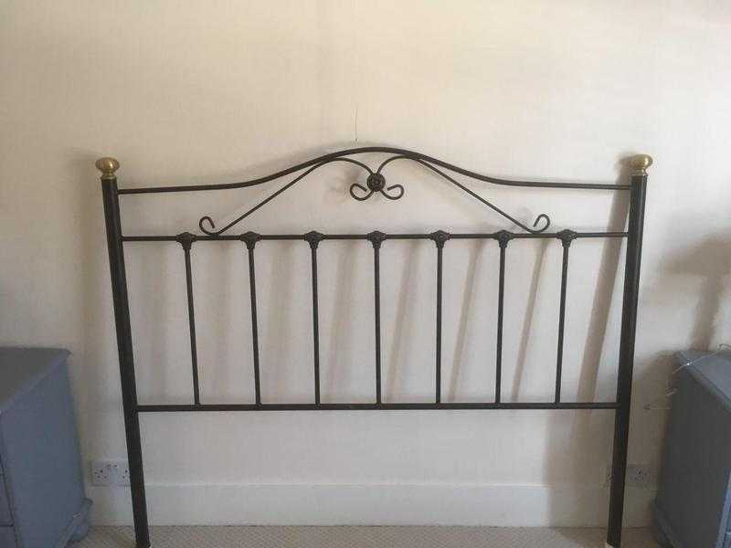 Ornate black metal headboard