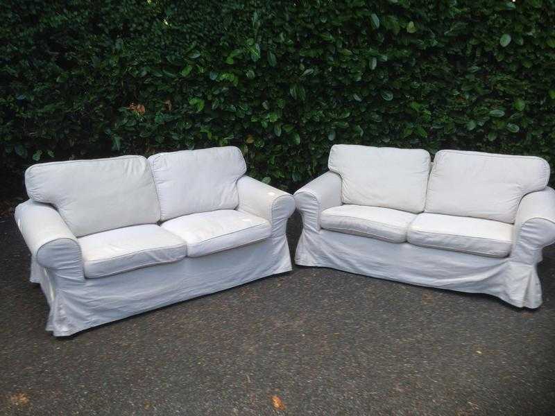 Pair of 2 Seater Ikea Sofas with spare covers