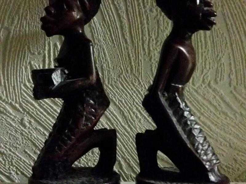 Pair of African style wooden candleholders