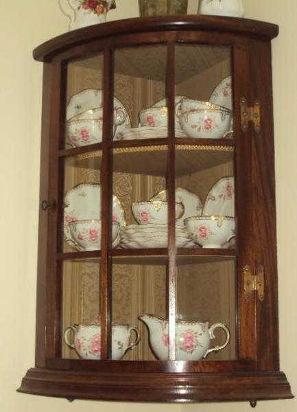 Pair of Beautiful Mahogany Bow Fronted Corner cabinets (will sell separately)