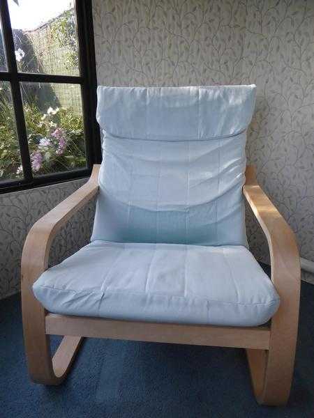 Pair of easy chairs and spare covers