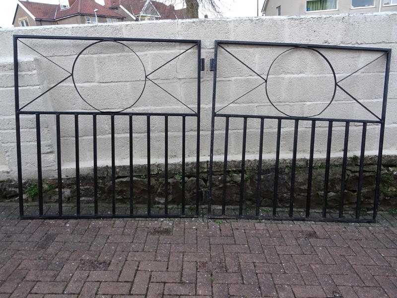 Pair of heavy Metal Gates, each approx 5 feet square