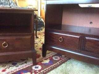 Pair of matching wood TV stands, with shelf and storage drawers