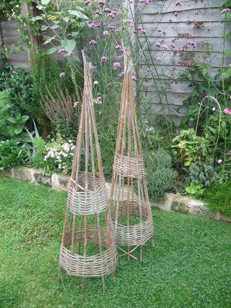 Pair of willow wicker spiral obelisks