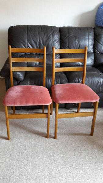 pair of wooden chairs