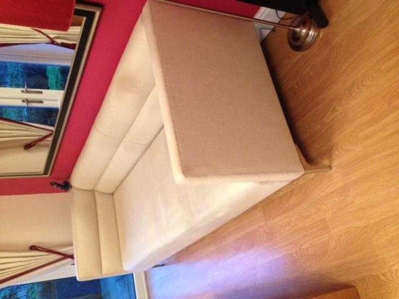 Pale cream 34 seater sofa. Very good condition.