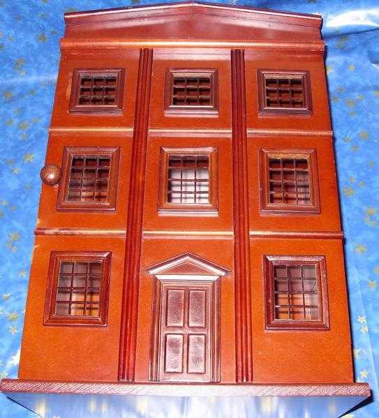 Past Times Display cabinet  shaped as a  Dolls house.  Wood