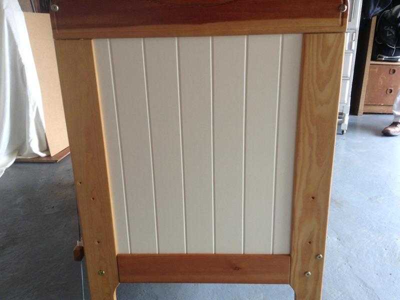 Pine and cream panelled cot with mattress and bedding