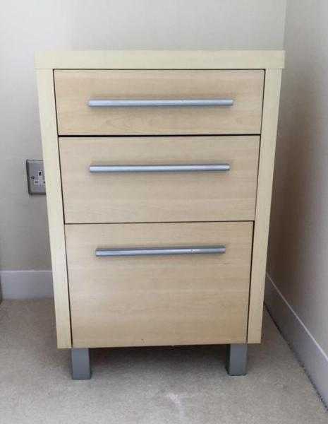 Pine coloured bedside table with 3 drawers