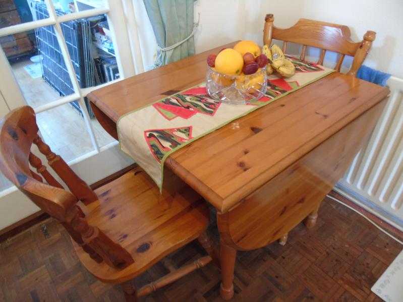 Pine drop leaf table with 2 pine chairs