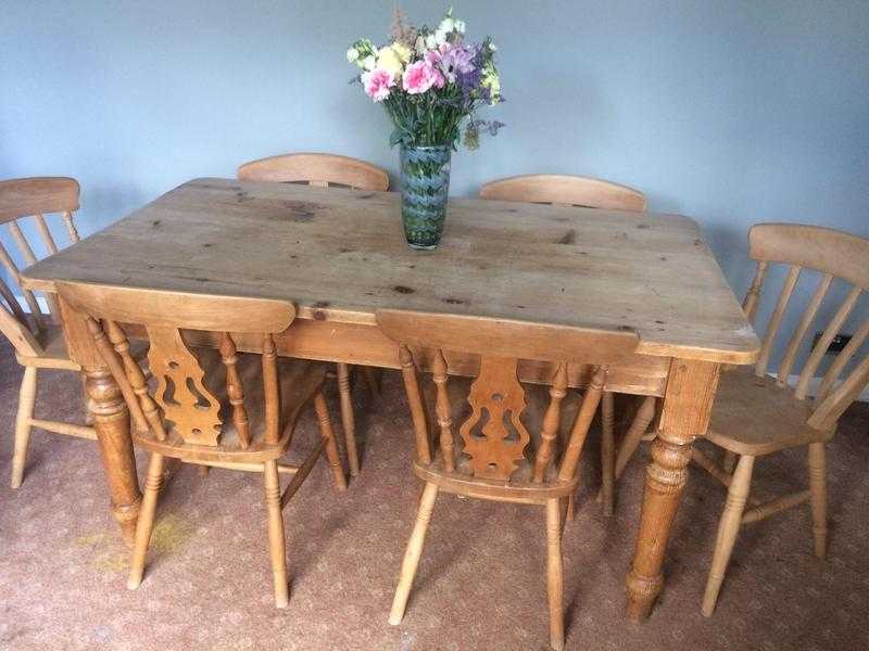 Pine farmhouse table and six chairs