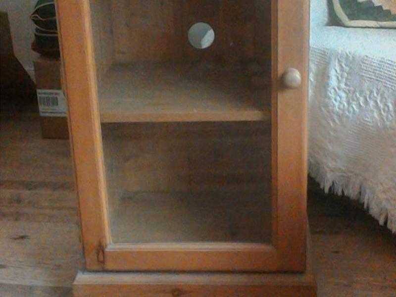 Pine glass fronted record cabinet