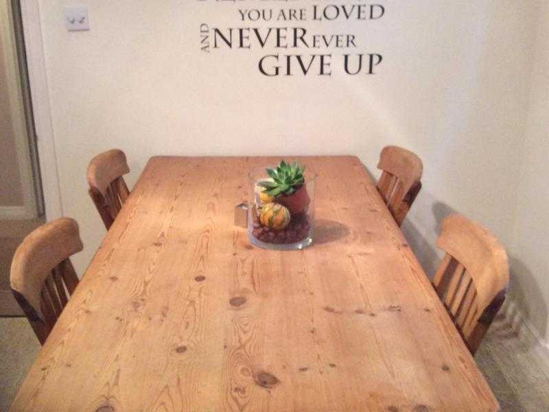 Pine kitchen table and six chairs