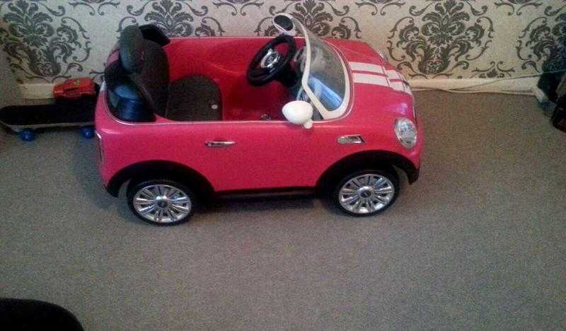 Pink electric mini Cooper